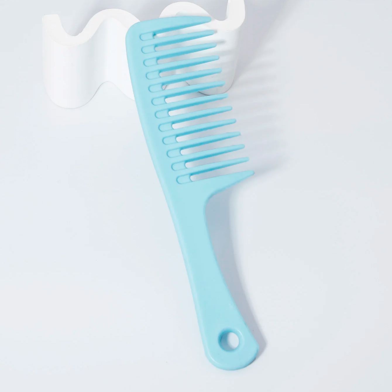 Kapperskam met brede tanden, a - Detangling Wide Comb recensie en prijs