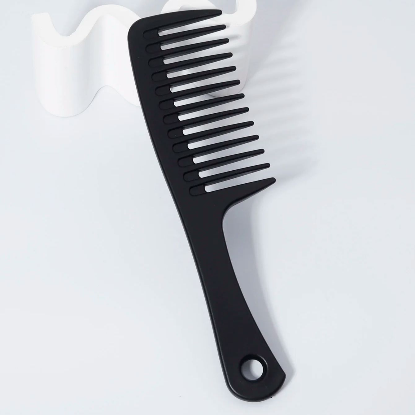 Kapperskam met brede tanden, a - Detangling Wide Comb recensie en prijs